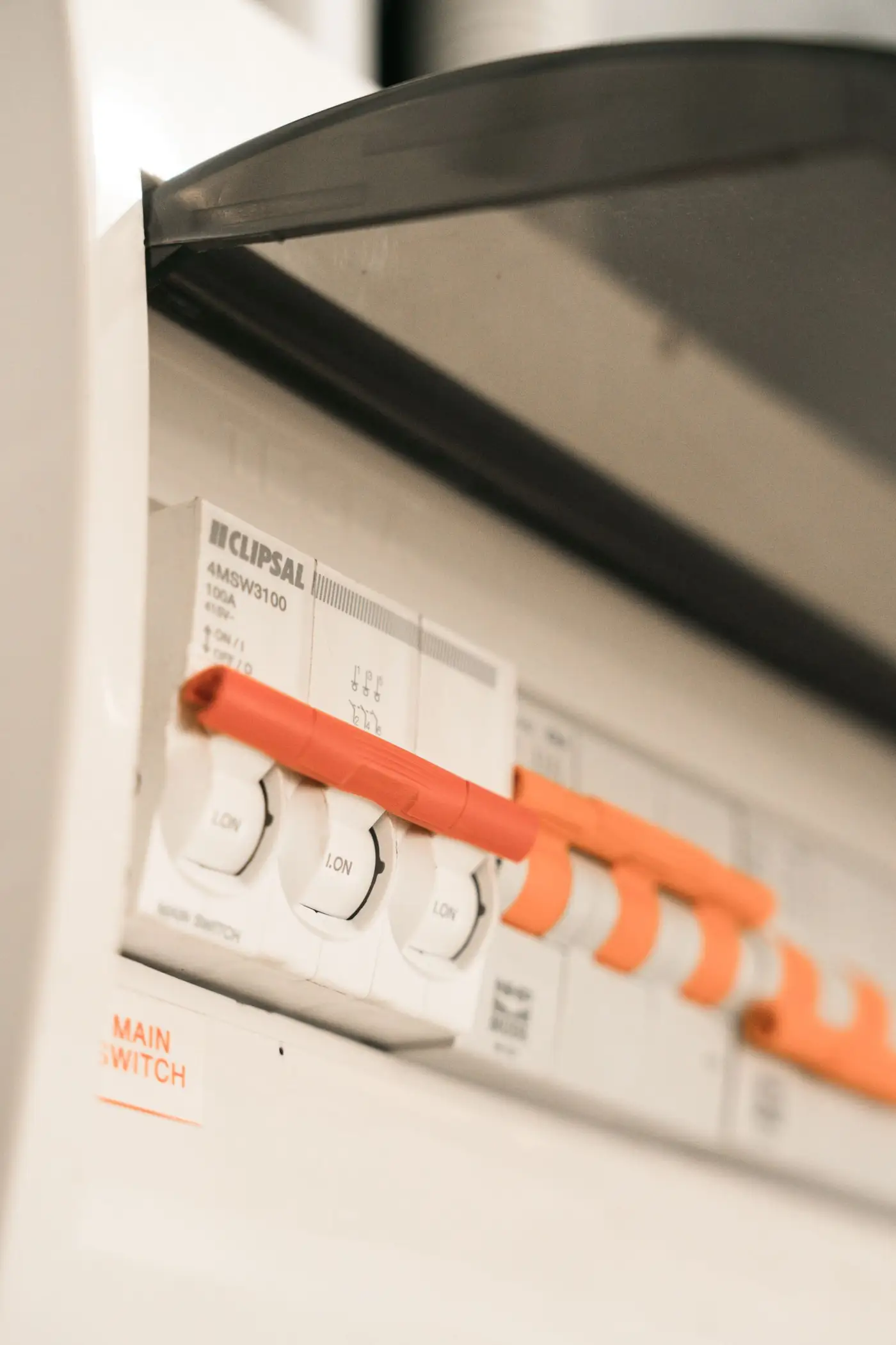 Close-up of circuit breakers in a residential switchboard